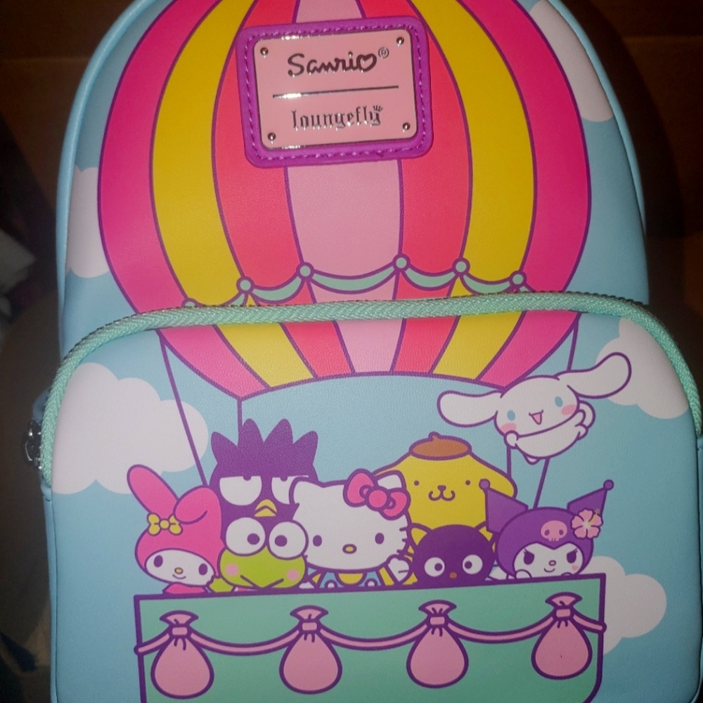 Loungefly Hello Kitty backpack and a hot air balloon with her friends